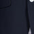 Close-up of a navy blue suit jacket with a button and pocket detail.