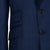 Close-up of a blue textured suit jacket with two buttons.