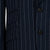Navy pinstripe suit jacket with buttons and pocket details on a plain background