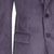Close-up of a purple corduroy jacket with buttons and a pocket on a white background